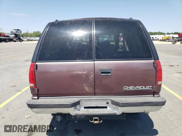 1997 Chevrolet Tahoe with VIN 1GNEK13R3VJ435765, listed as a Copart auction lot 65727515 with 140,548 mi miles and Salvage title. Bid and sale history available at DreamBid. Image 6.