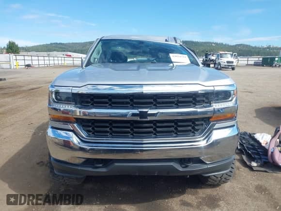2018 Chevrolet Silverado 1500 LT z VIN 3GCUKREC0JG402410, wystawiony jako IAAI lot #43034711 z przebiegiem 73 836 mil mil oraz . Historia ofert i sprzedaży dostępna na DreamBid. Obrazek 13.