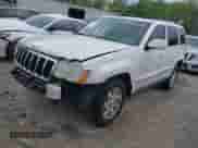 2009 Jeep Grand Cherokee with VIN 1J8GS58K49C532805, listed as a IAAI auction lot 42001527 with 104,979 mi miles and . Bid and sale history available at DreamBid. Image 2.