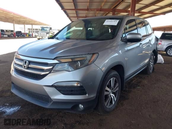 2018 Honda Pilot EX-L with VIN 5FNYF5H55JB031875, listed as a IAAI auction lot 43145763 with 99,165 mi miles and . Bid and sale history available at DreamBid. Image 17.