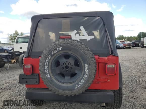 1998 Jeep Wrangler SE with VIN 1J4FY29P8WP767006, listed as a Copart auction lot 55603315 with 146,169 mi miles and Salvage title. Bid and sale history available at DreamBid. Image 6.
