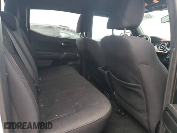 2017 Toyota Tacoma SR5 with VIN 3TMCZ5AN9HM093412, listed as a Copart auction lot 83841965 with 127,724 mi miles and Salvage title. Bid and sale history available at DreamBid. Image 10.