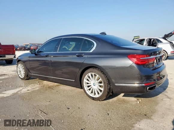 2016 BMW 7 Series 740i with VIN WBA7E2C56GG504652, listed as a Copart auction lot 67387155 with 103,660 mi miles and Clean title. Bid and sale history available at DreamBid. Image 2.