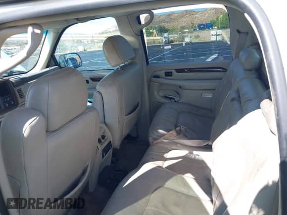 2002 Cadillac Escalade EXT with VIN 3GYEK63N32G288941, listed as a IAAI auction lot 43235158 with 295,475 mi miles and . Bid and sale history available at DreamBid. Image 8.