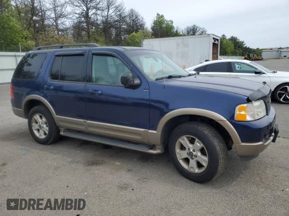 2004 Ford Explorer Eddie Bauer with VIN 1FMDU74W64UB74730, listed as a Copart auction lot 58534535 with 167,112 mi miles and Salvage title. Bid and sale history available at DreamBid. Image 4.