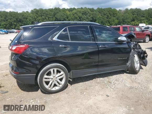 2019 Chevrolet Equinox Premier with VIN 3GNAXNEV9KL209297, listed as a Copart auction lot 64791585 with 105,810 mi miles and Salvage title. Bid and sale history available at DreamBid. Image 3.
