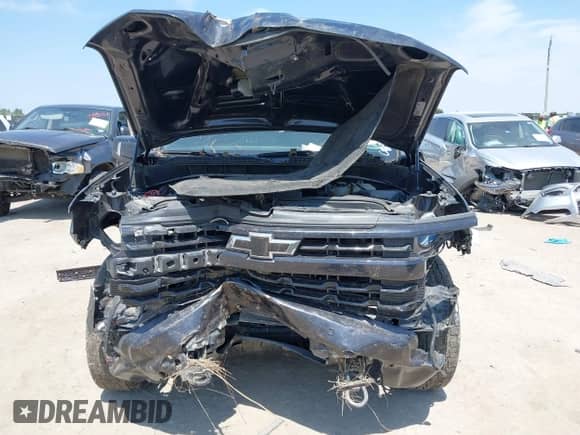 2024 Chevrolet Silverado 1500 RST with VIN 1GCUDEED8RZ166452, listed as a IAAI auction lot 43095521 with 50,889 mi miles and . Bid and sale history available at DreamBid. Image 12.