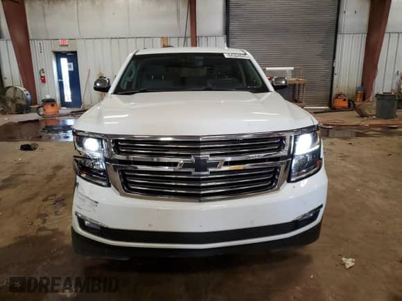 2015 Chevrolet Tahoe LTZ с VIN 1GNSKCKC3FR595045, выставлен на аукционе Copart как лот 64304845 с пробегом 150 535 миль миль и Чистый • Clean title. История ставок и продаж доступна на DreamBid. Изображение 5.