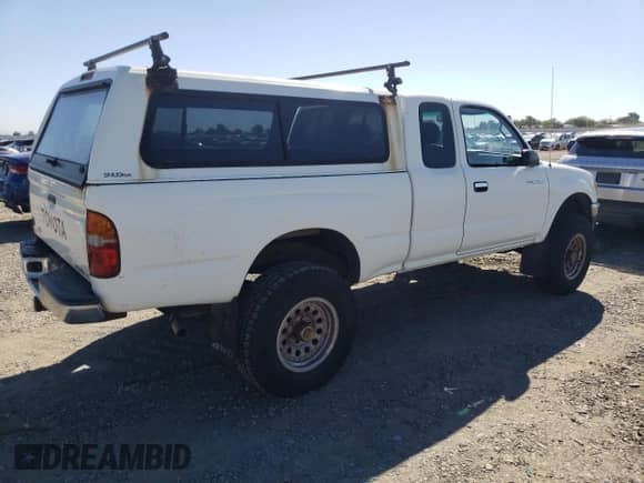 1997 Toyota Tacoma with VIN 4TAWN72N1VZ242680, listed as a Copart auction lot 85537735 with 218,563 mi miles and Clean title. Bid and sale history available at DreamBid. Image 3.