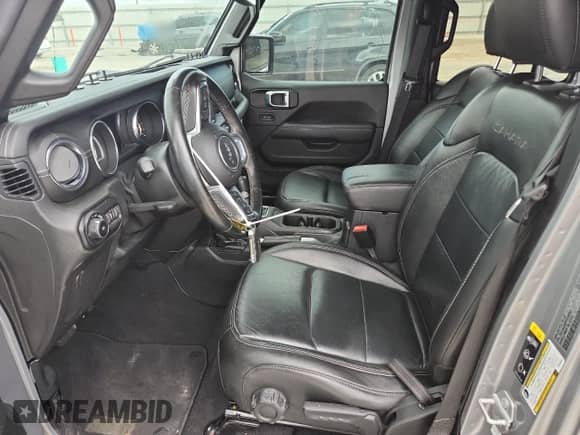 2021 Jeep Wrangler Unlimited Sahara High Altitude with VIN 1C4HJXEN3MW563852, listed as a Copart auction lot 65043775 with 42,626 mi miles and Salvage title. Bid and sale history available at DreamBid. Image 7.