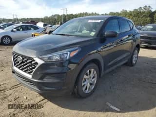 2019 Hyundai Tucson SE z VIN KM8J23A4XKU904334, wystawiony jako Copart lot #82676545 z przebiegiem 166 081 mil mil oraz Czysty tytuł • Clean title. Historia ofert i sprzedaży dostępna na DreamBid. Obrazek 1.