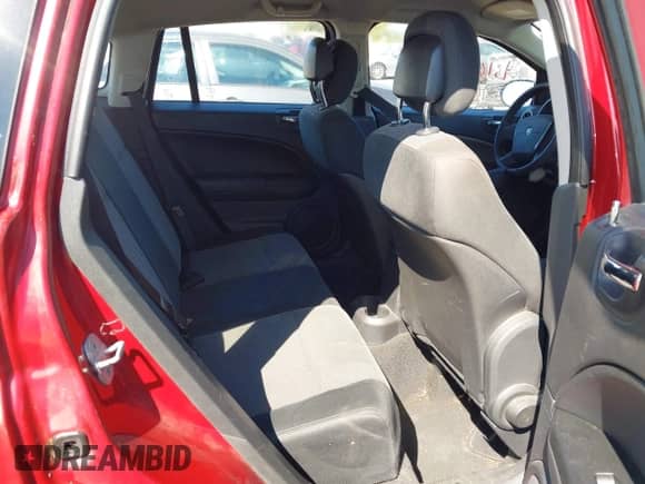 2010 Dodge Caliber Mainstreet with VIN 1B3CB3HAXAD581024, listed as a IAAI auction lot 43167115 with 188,315 mi miles and . Bid and sale history available at DreamBid. Image 8.