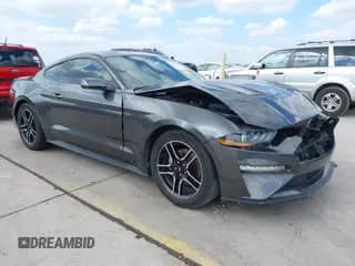 2020 Ford Mustang EcoBoost z VIN 1FA6P8TH4L5108592, wystawiony jako IAAI lot #43178370 z przebiegiem 80 795 mil mil oraz . Historia ofert i sprzedaży dostępna na DreamBid. Obrazek 1.