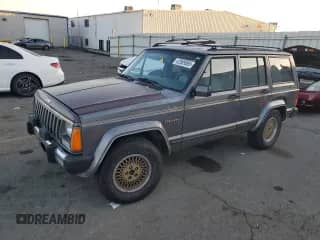 1989 Jeep Grand Cherokee with VIN 1J4FJ78L6KL643236, listed as a Copart auction lot 42989565 with 115,837 mi miles and Salvage title. Bid and sale history available at DreamBid. Image 1.