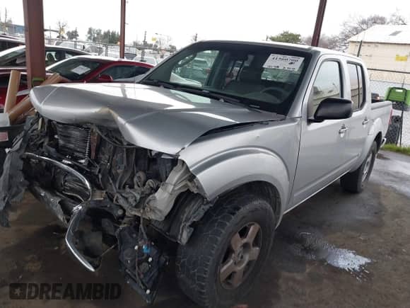 2006 Nissan Frontier LE with VIN 1N6AD07U06C436191, listed as a IAAI auction lot 41560700 with 185,712 mi miles and . Bid and sale history available at DreamBid. Image 18.