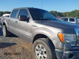 2013 Ford F-150 XL with VIN 1FTFW1ET3DKE67604, listed as a IAAI auction lot 43367727 with 216,799 mi miles and . Bid and sale history available at DreamBid. Image 1.