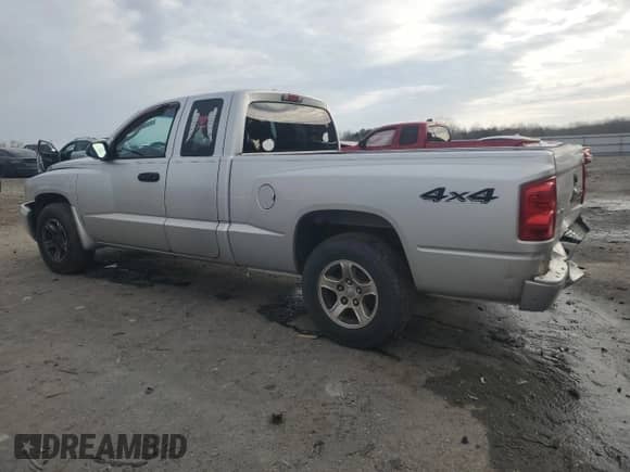 2007 Dodge Dakota SLT с VIN 1D7HW42P67S103740, выставлен на аукционе Copart как лот 42801165 с пробегом 239 043 миль миль и Списание • Salvage title. История ставок и продаж доступна на DreamBid. Изображение 2.