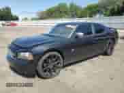 2008 Dodge Charger SXT with VIN 2B3KA33G18H329282, listed as a Copart auction lot 80059965 with 188,832 mi miles and Salvage title. Bid and sale history available at DreamBid. Image 1.