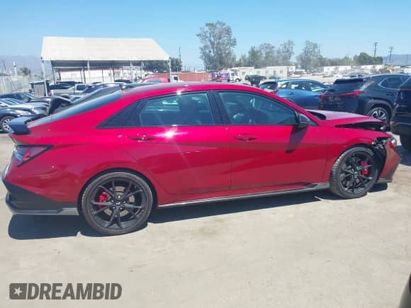 2025 Hyundai Elantra z VIN KMHLW4DKXSU025686, wystawiony jako IAAI lot #42673114 z przebiegiem 4 427 mil mil oraz . Historia ofert i sprzedaży dostępna na DreamBid. Obrazek 13.