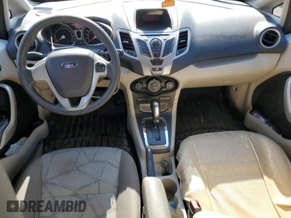 2012 Ford Fiesta SE with VIN 3FADP4BJ6CM204786, listed as a Copart auction lot 70699705 with 101,559 mi miles and Salvage title. Bid and sale history available at DreamBid. Image 8.