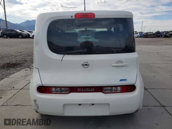 2013 Nissan Cube S z VIN JN8AZ2KR9DT301800, wystawiony jako Copart lot #72103315 z przebiegiem 138 789 mil mil oraz Szkoda całkowita • Salvage title. Historia ofert i sprzedaży dostępna na DreamBid. Obrazek 6.