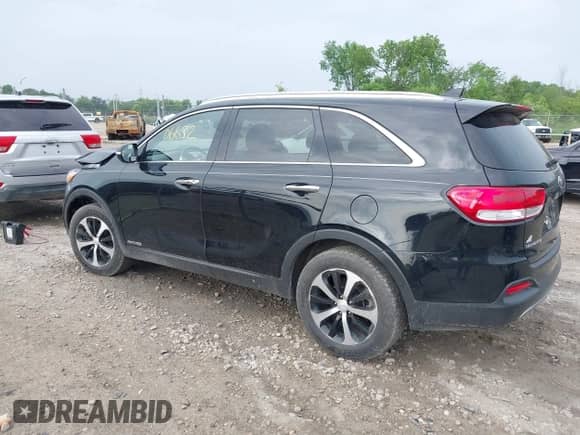 2018 Kia Sorento EX with VIN 5XYPHDA53JG386482, listed as a IAAI auction lot 42506632 with 128,886 mi miles and . Bid and sale history available at DreamBid. Image 3.