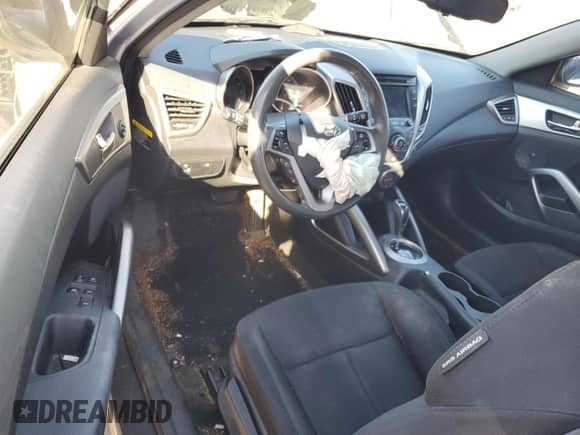 2013 Hyundai Veloster w/Black Int с VIN KMHTC6AD9DU086279, выставлен на аукционе Copart как лот 85276815 с пробегом 201 554 миль миль и Списание • Salvage title. История ставок и продаж доступна на DreamBid. Изображение 8.