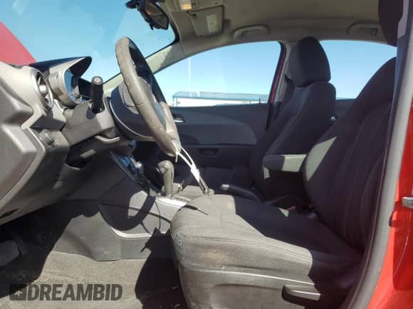 2016 Chevrolet Sonic LT with VIN 1G1JC5SB2G4131496, listed as a Copart auction lot 49766805 with 116,183 mi miles and Salvage title. Bid and sale history available at DreamBid. Image 7.