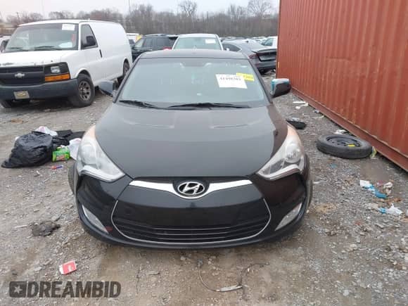 2014 Hyundai Veloster with VIN KMHTC6AD6EU182596, listed as a IAAI auction lot 41498382 with 99,376 mi miles and . Bid and sale history available at DreamBid. Image 12.