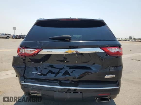 2020 Chevrolet Traverse High Country with VIN 1GNERNKW0LJ143224, listed as a Copart auction lot 64682365 with 49,886 mi miles and Salvage title. Bid and sale history available at DreamBid. Image 6.