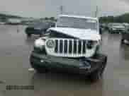 2022 Jeep Wrangler Unlimited Sahara Altitude with VIN 1C4HJXEG6NW105998, listed as a Copart auction lot 60070715 with 84,676 mi miles and Salvage title. Bid and sale history available at DreamBid. Image 14.