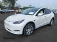 2023 Tesla Model Y Long Range with VIN 7SAYGDEE5PF633389, listed as a IAAI auction lot 42969850 with 16,889 mi miles and . Bid and sale history available at DreamBid. Image 16.