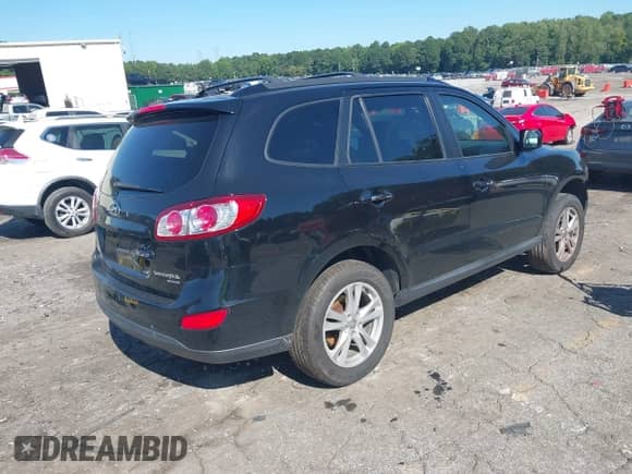 2011 Hyundai Santa Fe Limited z VIN 5XYZK3AB3BG074920, wystawiony jako IAAI lot #43095257 z przebiegiem 108 654 mil mil oraz . Historia ofert i sprzedaży dostępna na DreamBid. Obrazek 4.