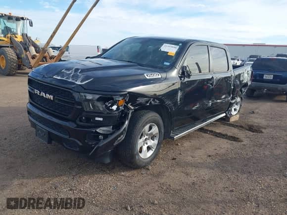 2023 Ram 1500 Tradesman with VIN 1C6RREGT6PN620043, listed as a IAAI auction lot 41465056 with 19,249 mi miles and . Bid and sale history available at DreamBid. Image 2.
