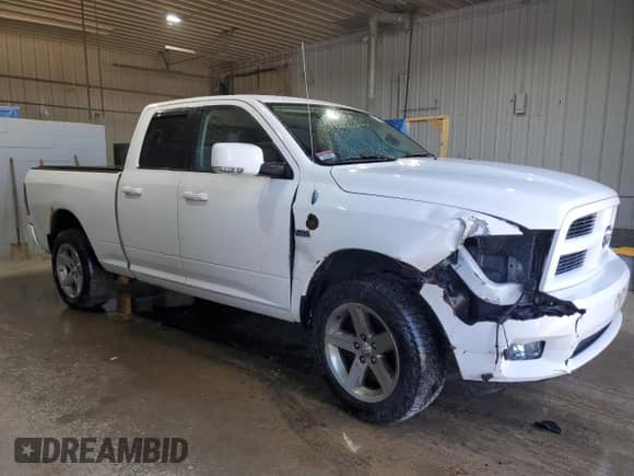 2012 Ram 1500 Sport with VIN 1C6RD7HT1CS198249, listed as a Copart auction lot 53882215 with 208,544 mi miles and Salvage title. Bid and sale history available at DreamBid. Image 4.