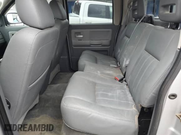 2005 Dodge Dakota Laramie z VIN 1D7HW58N95S200293, wystawiony jako Copart lot #56053075 z przebiegiem 104 769 mil mil oraz Szkoda całkowita • Salvage title. Historia ofert i sprzedaży dostępna na DreamBid. Obrazek 10.