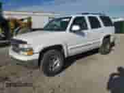 2002 Chevrolet Tahoe LT with VIN 1GNEK13T52R138456, listed as a Copart auction lot 89697285 with 218,837 mi miles and Salvage title. Bid and sale history available at DreamBid. Image 1.