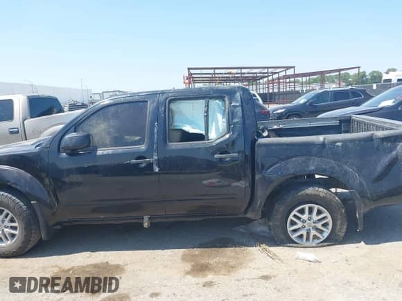 2018 Nissan Frontier SV with VIN 1N6DD0ER6JN701415, listed as a IAAI auction lot 43145718 with 164,798 mi miles and . Bid and sale history available at DreamBid. Image 14.