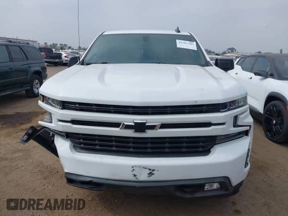 2019 Chevrolet Silverado 1500 RST z VIN 1GCPWDEDXKZ139146, wystawiony jako IAAI lot #42582303 z przebiegiem 67 500 mil mil oraz . Historia ofert i sprzedaży dostępna na DreamBid. Obrazek 13.