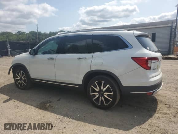 2020 Honda Pilot Touring 8-Passenger z VIN 5FNYF6H94LB051790, wystawiony jako Copart lot #67845865 z przebiegiem 63 874 mil mil oraz Szkoda całkowita • Salvage title. Historia ofert i sprzedaży dostępna na DreamBid. Obrazek 2.