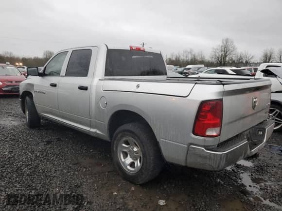 2012 Ram 1500 Tradesman с VIN 1C6RD7KP2CS306082, выставлен на аукционе Copart как лот 85816134 с пробегом 140 619 миль миль и Списание • Salvage title. История ставок и продаж доступна на DreamBid. Изображение 2.