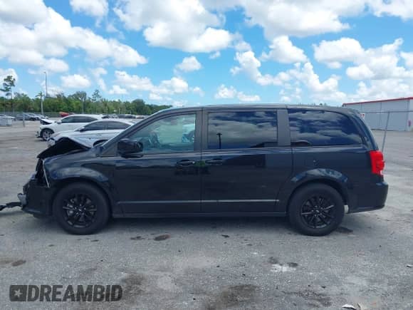2019 Dodge Grand Caravan GT with VIN 2C4RDGEG2KR675982, listed as a IAAI auction lot 42970109 with 104,372 mi miles and . Bid and sale history available at DreamBid. Image 14.