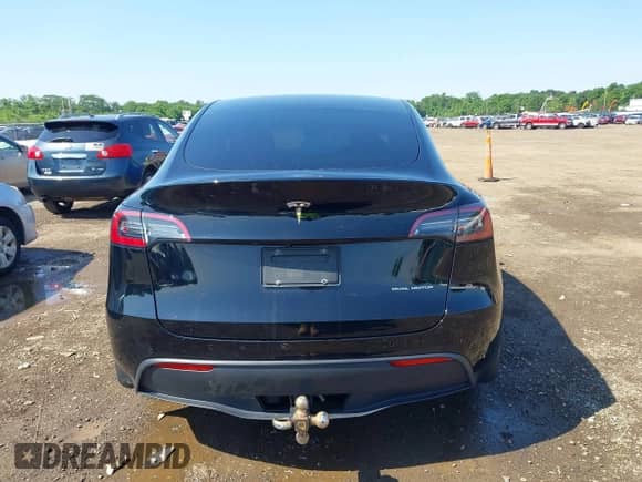 2022 Tesla Model Y Long Range z VIN 7SAYGDEE8NF434074, wystawiony jako IAAI lot #42522198 z przebiegiem 37 469 mil mil oraz . Historia ofert i sprzedaży dostępna na DreamBid. Obrazek 15.