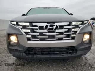 2022 Hyundai Santa Cruz SEL with VIN 5NTJBDAE9NH007248, listed as a Copart auction lot 83865055 with 51,722 mi miles and Salvage title. Bid and sale history available at DreamBid. Image 5.