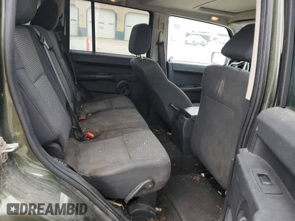 2008 Jeep Commander Sport z VIN 1J8HG48K18C153890, wystawiony jako Copart lot #53191825 z przebiegiem 208 419 mil mil oraz Czysty tytuł • Clean title. Historia ofert i sprzedaży dostępna na DreamBid. Obrazek 10.