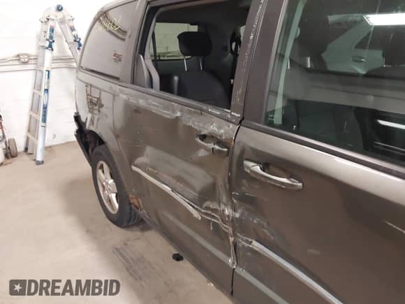 2010 Dodge Grand Caravan SXT with VIN 2D4RN5D14AR416488, listed as a IAAI auction lot 38412602 with 136,997 mi miles and . Bid and sale history available at DreamBid. Image 6.