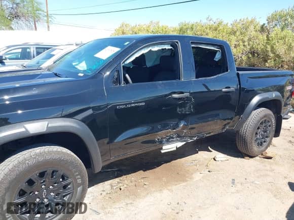 2023 Chevrolet Colorado 4WD Trail Boss with VIN 1GCPTEEK8P1126284, listed as a IAAI auction lot 42397525 with 15,917 mi miles and . Bid and sale history available at DreamBid. Image 6.