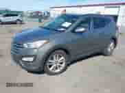2014 Hyundai Santa Fe with VIN 5XYZWDLA0EG135854, listed as a IAAI auction lot 42995069 with 140,135 mi miles and . Bid and sale history available at DreamBid. Image 2.