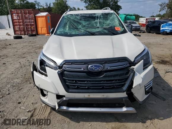2023 Subaru Forester Touring z VIN JF2SKARC4PH470812, wystawiony jako Copart lot #82031845 z przebiegiem 37 962 mil mil oraz Szkoda całkowita • Salvage title. Historia ofert i sprzedaży dostępna na DreamBid. Obrazek 5.