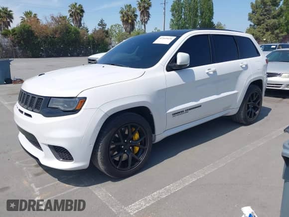 2018 Jeep Grand Cherokee Trackhawk with VIN 1C4RJFN97JC199045, listed as a IAAI auction lot 42169426 with 17,140 mi miles and . Bid and sale history available at DreamBid. Image 17.